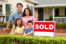 Family with Sold Sign 